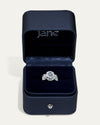 8.02CT Oval Cut Three-Stone Diamond Ring with Side Stones